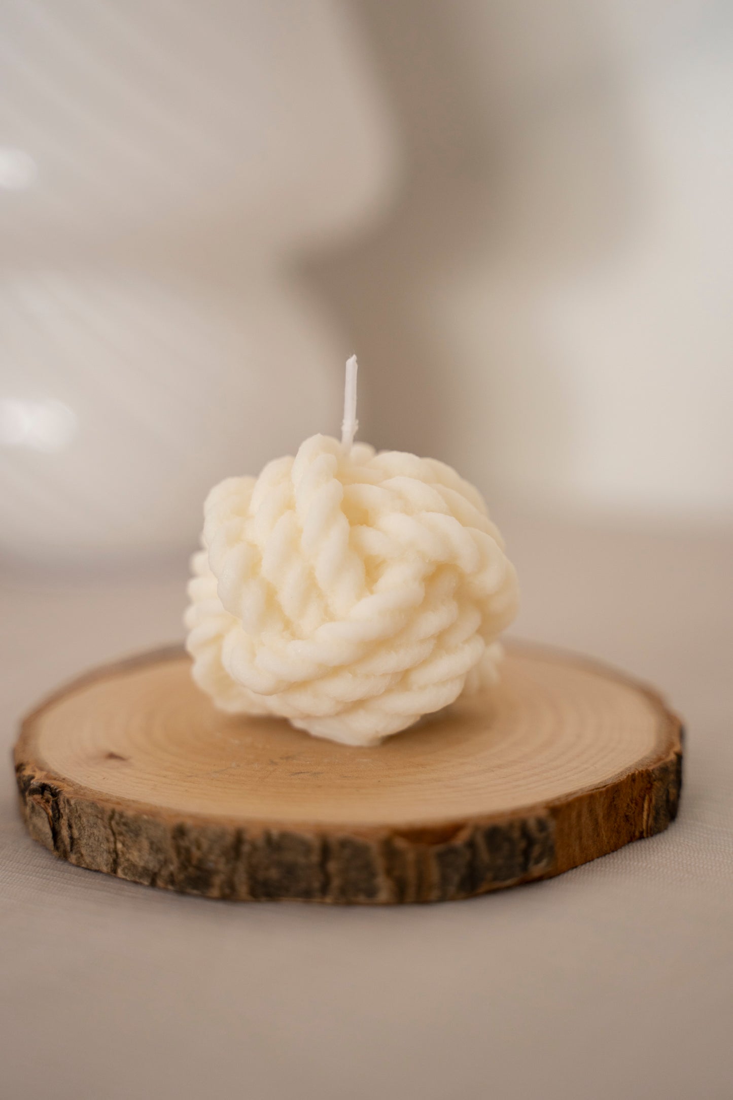 Wollknoten Kerze